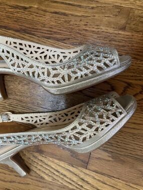 Metallic Gold Slingback Sandals with approx 2” heel.